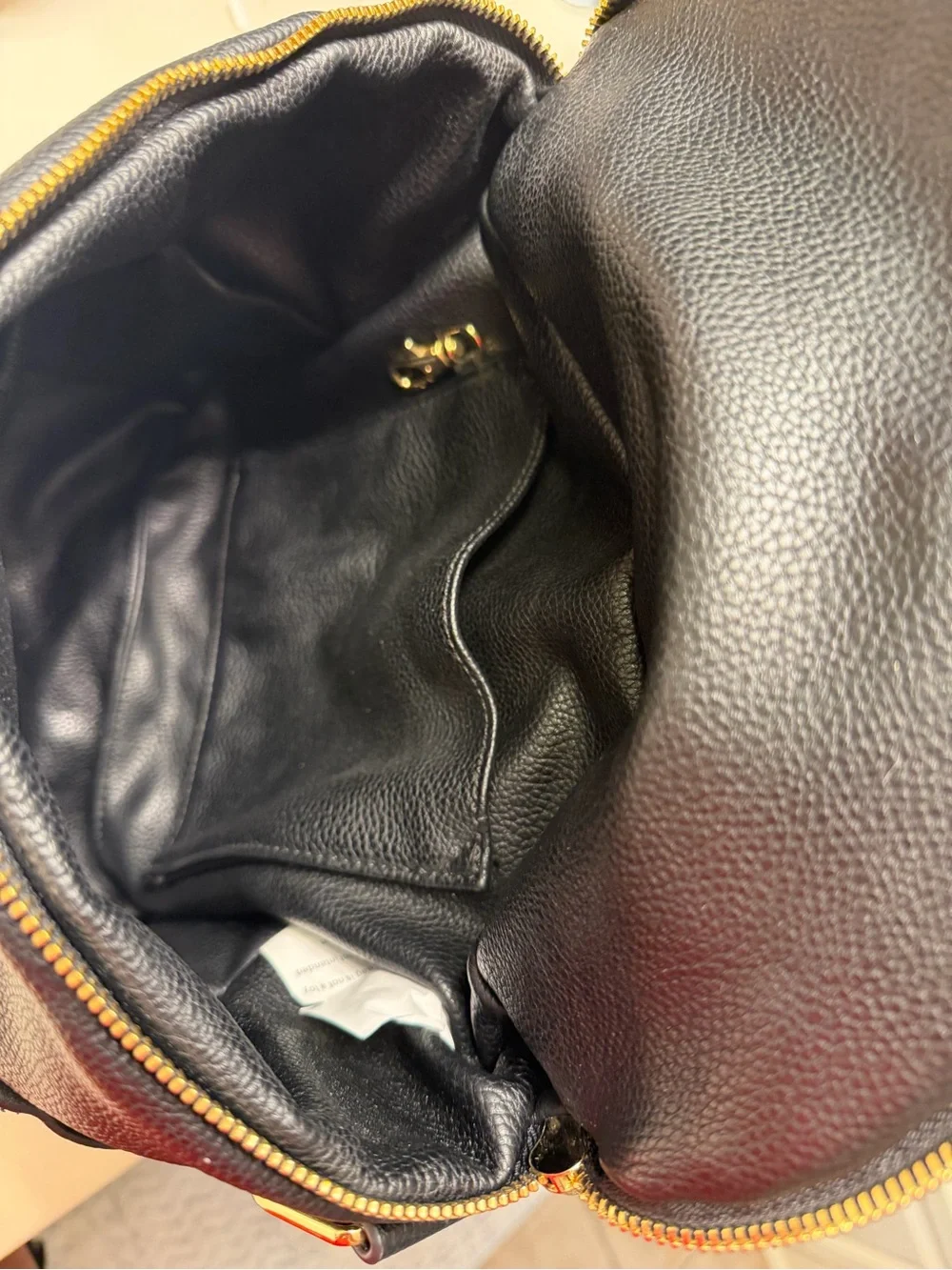FAWN DESIGN Black Pebbled Leather Crossbody Backpack with Gold Hardware